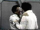 A $15K winner hugs Billy in gratitude