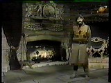 Treguard stands next to his fireplace